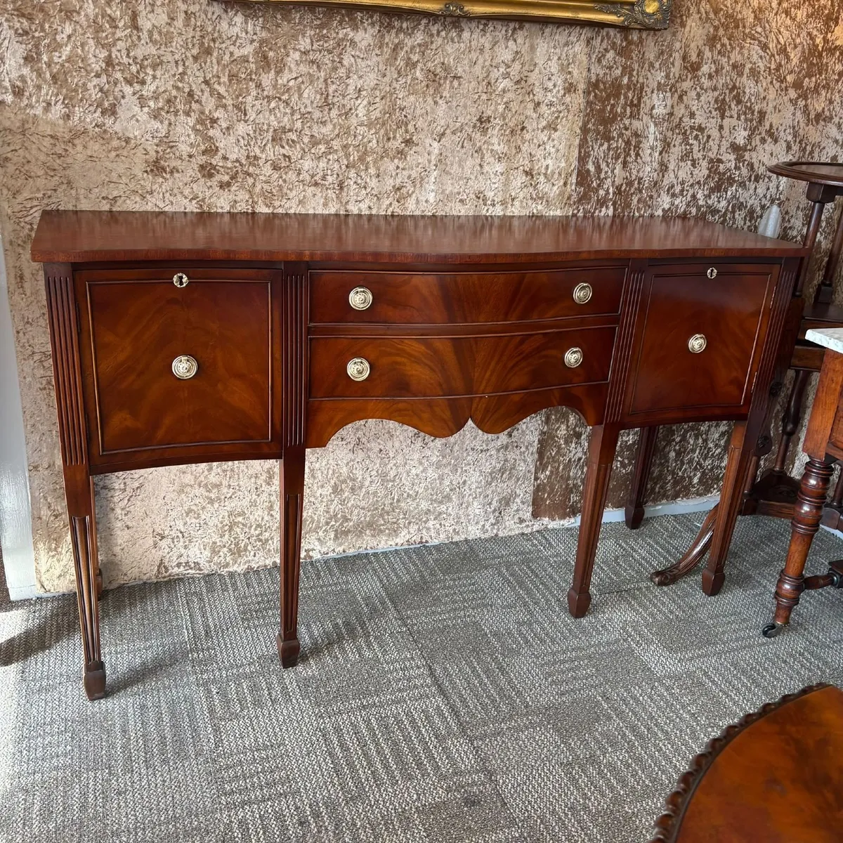 An attractive mahogany flamed bow fronted serpenti - Image 1