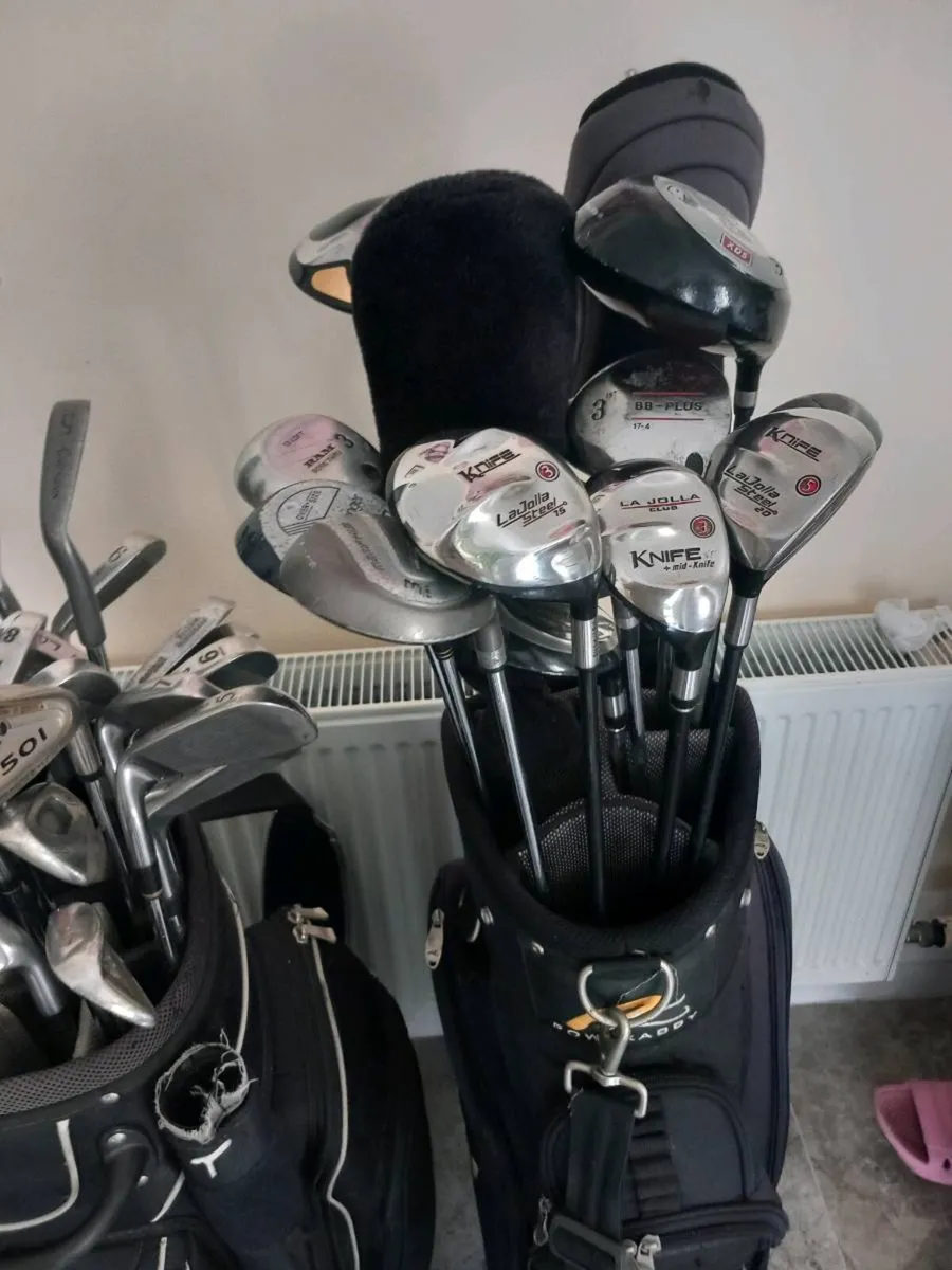 A selection of golf clubs and bags. - Image 4