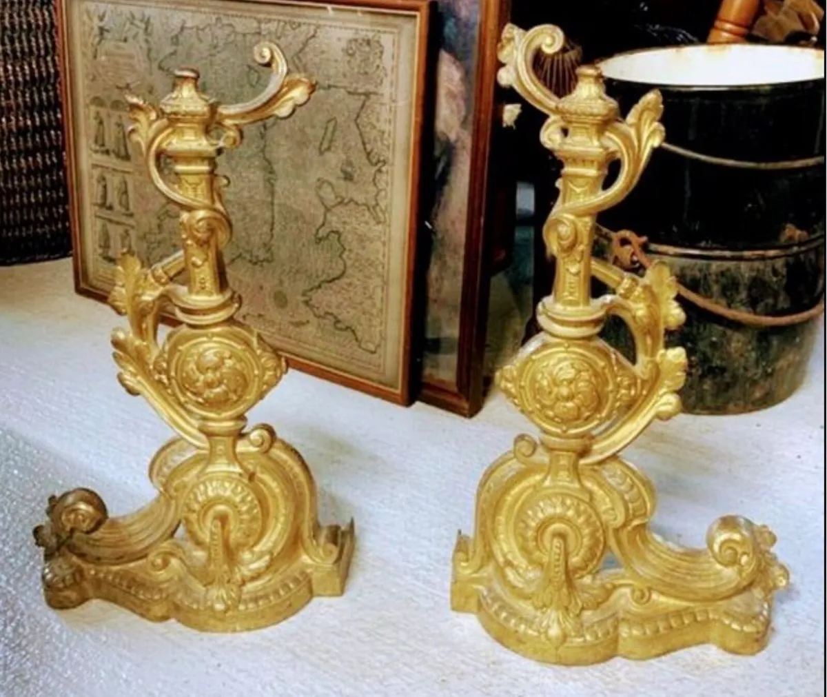 Brass fire dogs