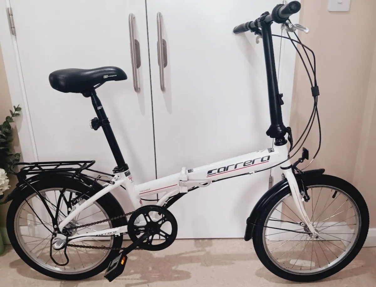 Carrera transit folding bike hardly used - Image 1