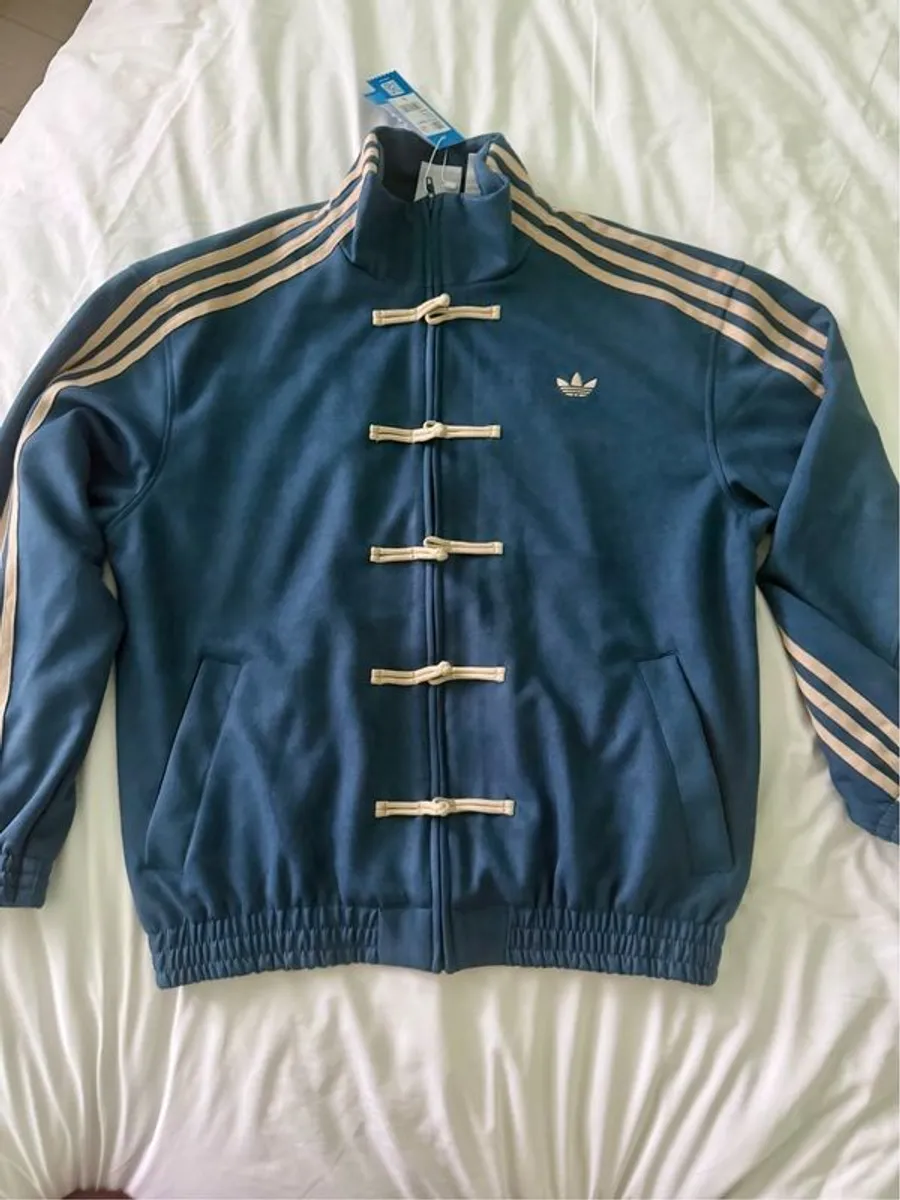 Adidas "TANG" jacket.
