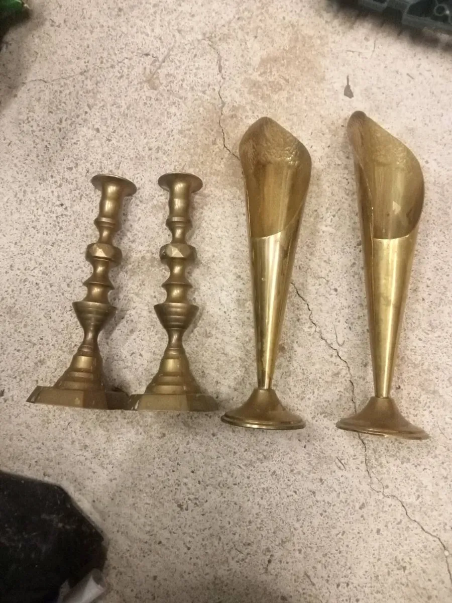 Old brass candle and flower holders