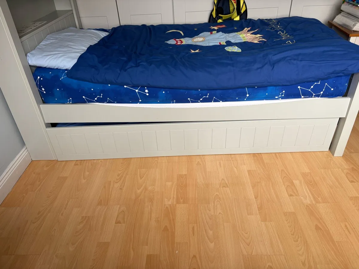 Trundle Bed with built in book storage shelf - Image 1