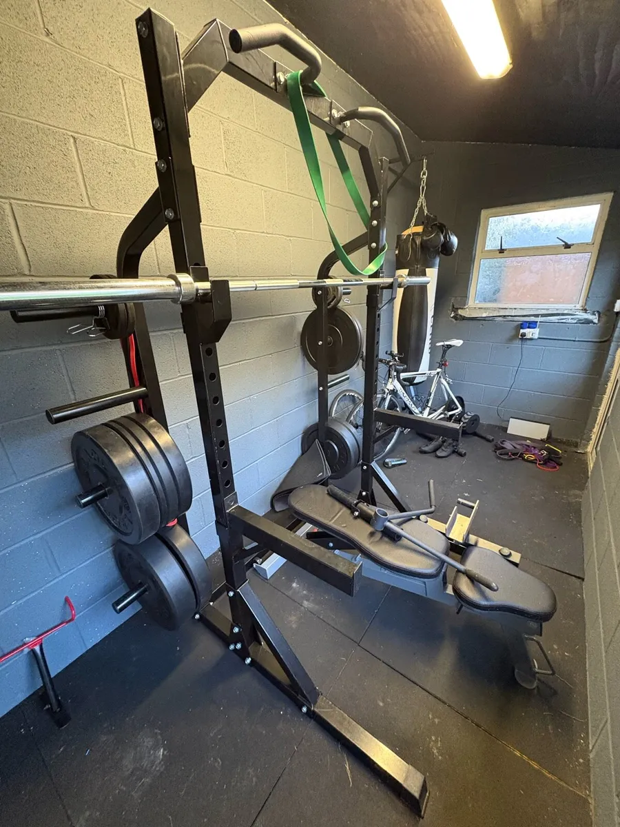 Half rack + Olympic Barbell + 150KG of plates - Image 1