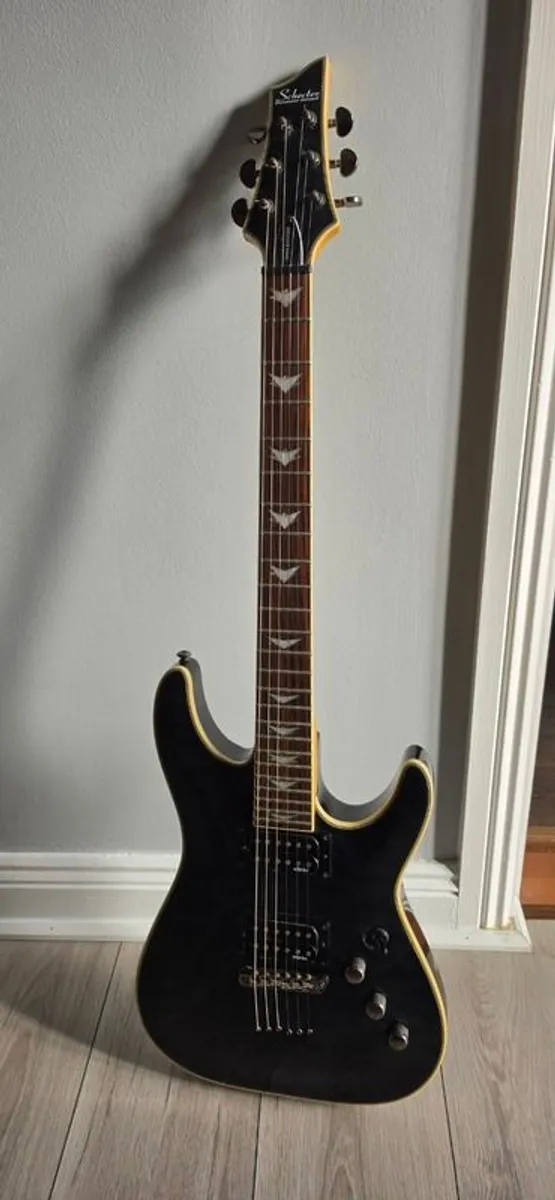 Schecter Omen-6 Extreme Electric Guitar with BOSS KTN-50 amp - Image 1
