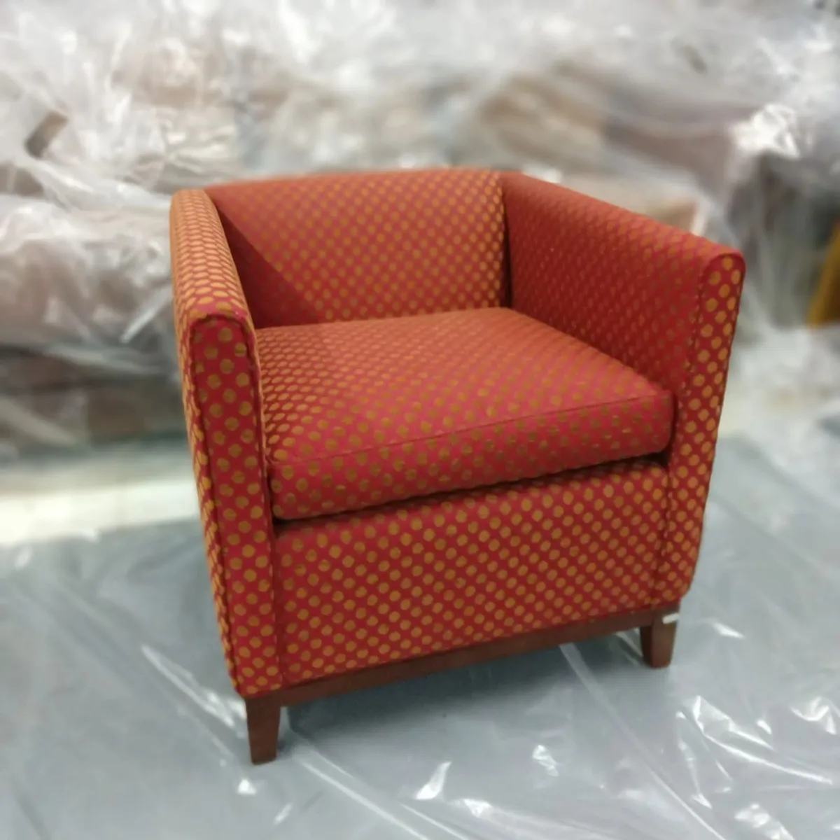 Tub armchair with red/ochre dot fabric - Image 1