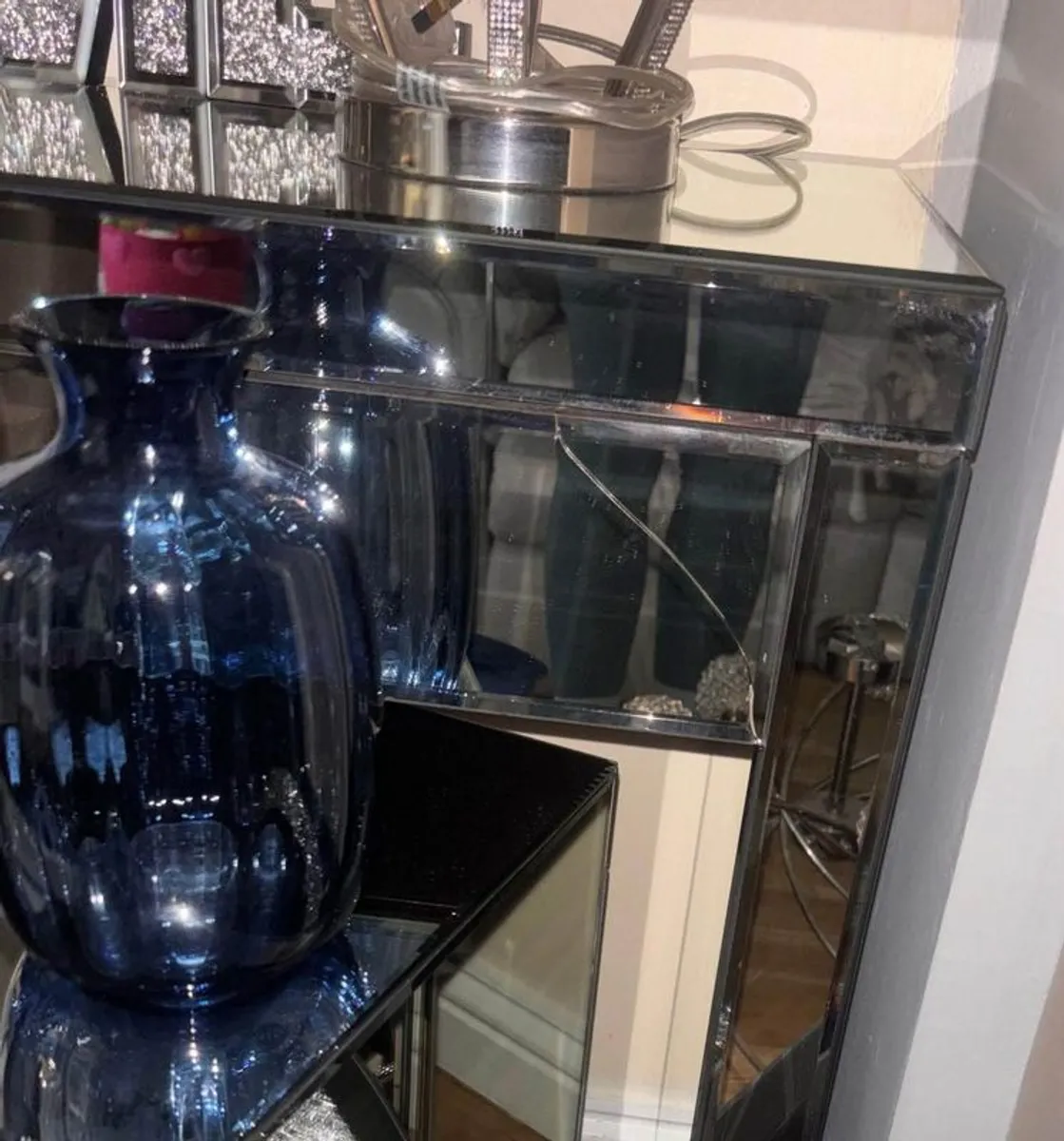 Mirrored furniture with navy velvet accessories - Image 1