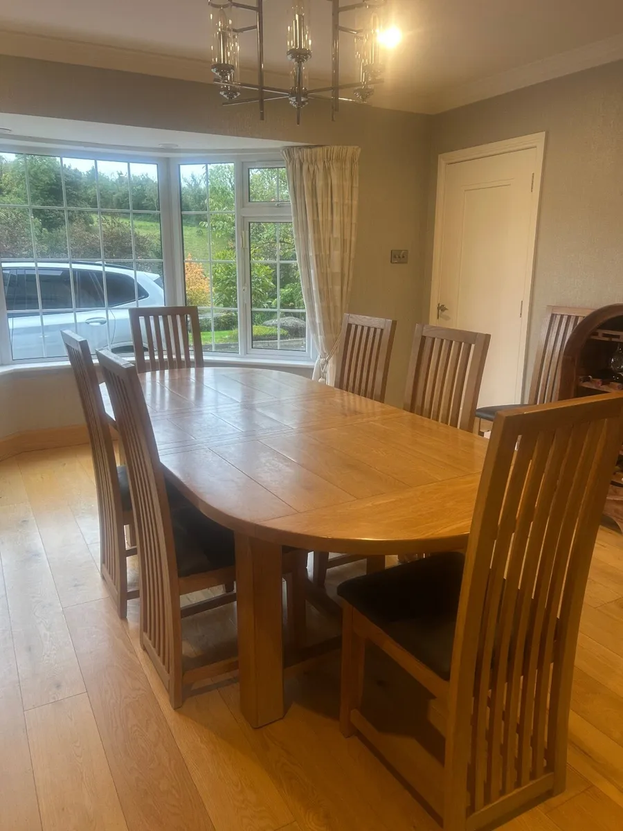 Kitchen table and 8 chairs - Image 1