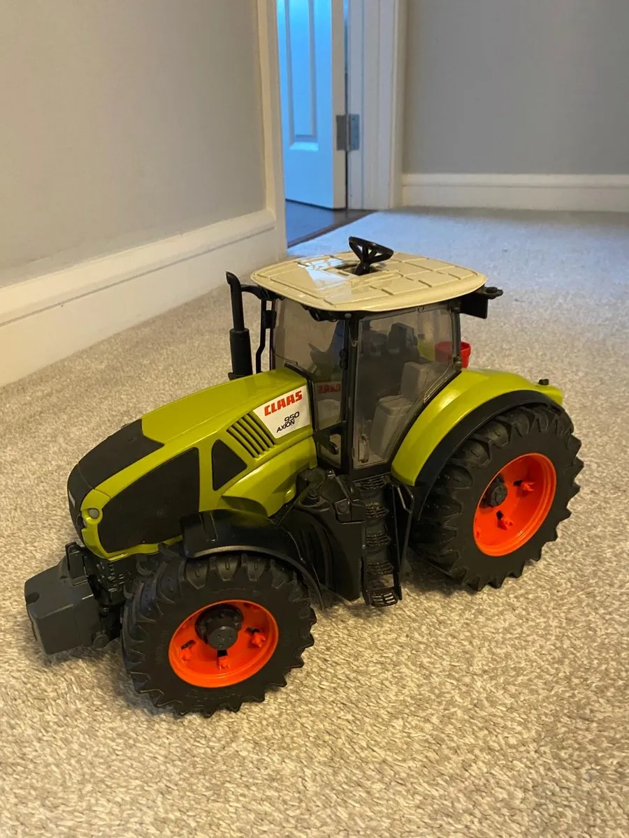 Bruder class tractor and accessories - Image 1