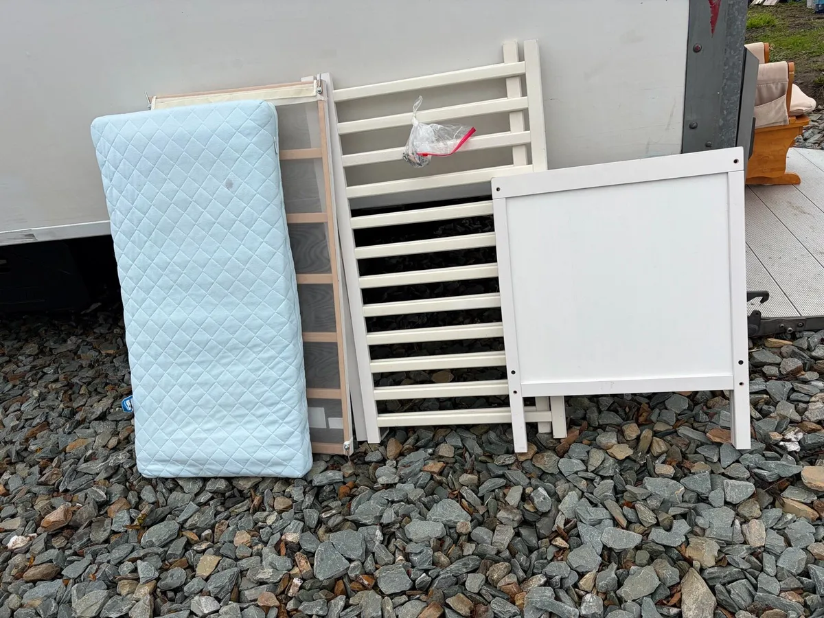 ikea cot bed frame + mattress €50 - Image 1