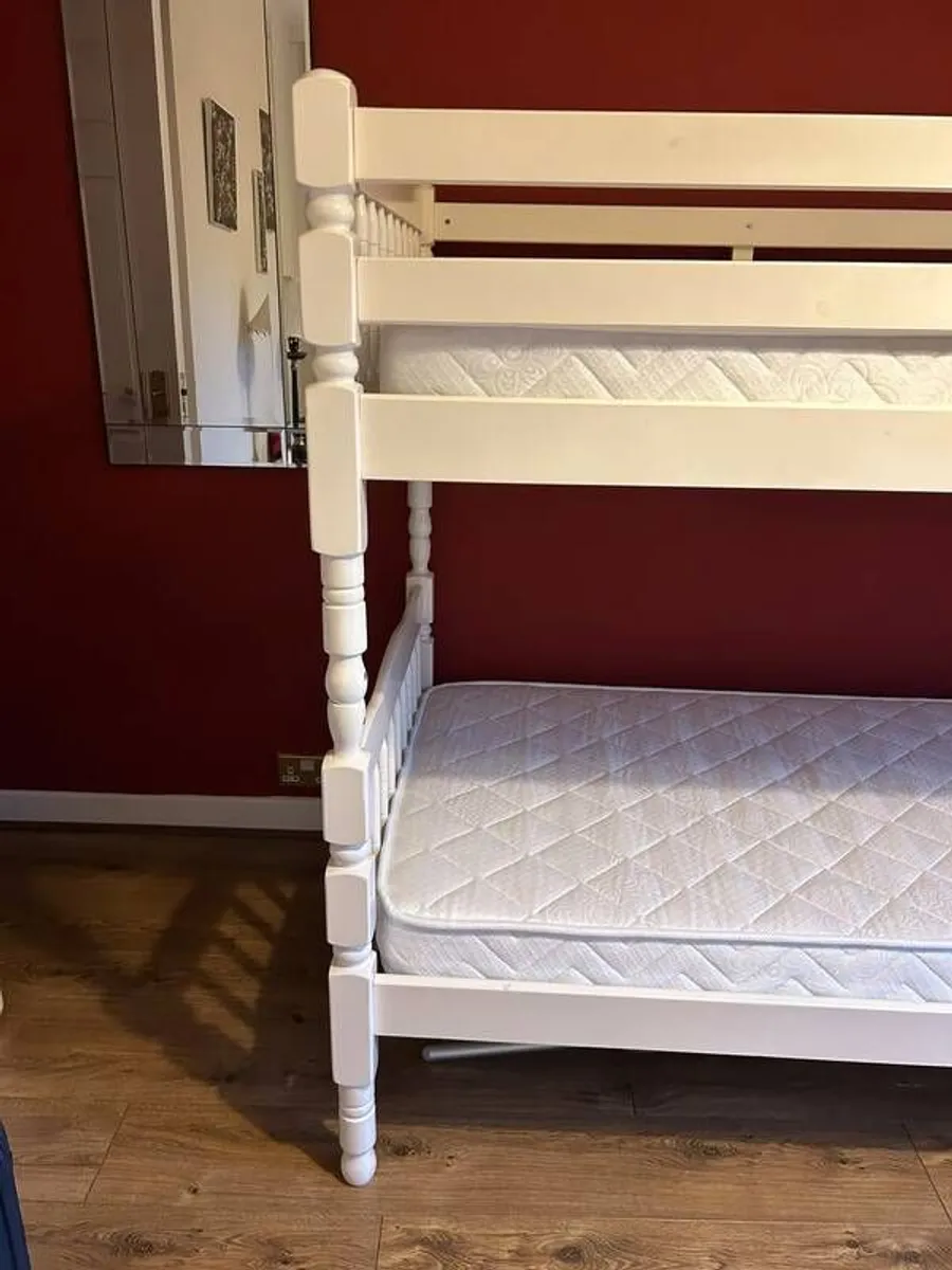 White wooden bunk beds with mattresses - Image 2