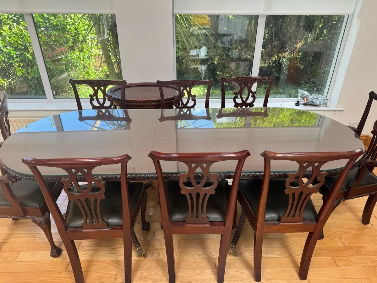 Brown antique dining tables and 8 chairs - Image 1