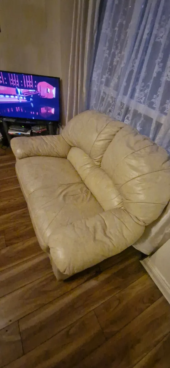 2 seater leather couch (free delivery) - Image 1