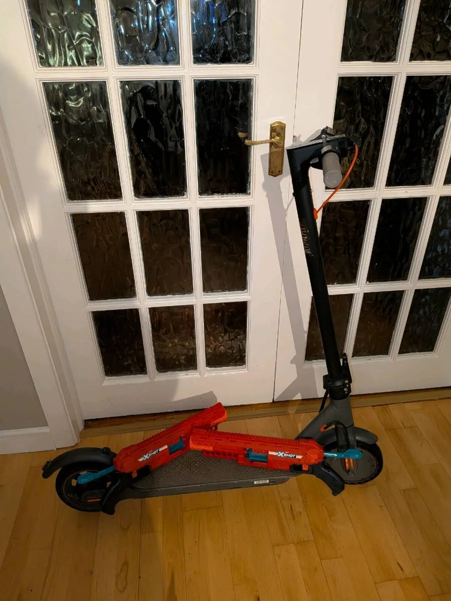 Electric Scooter + 2 Free Nerf Guns!