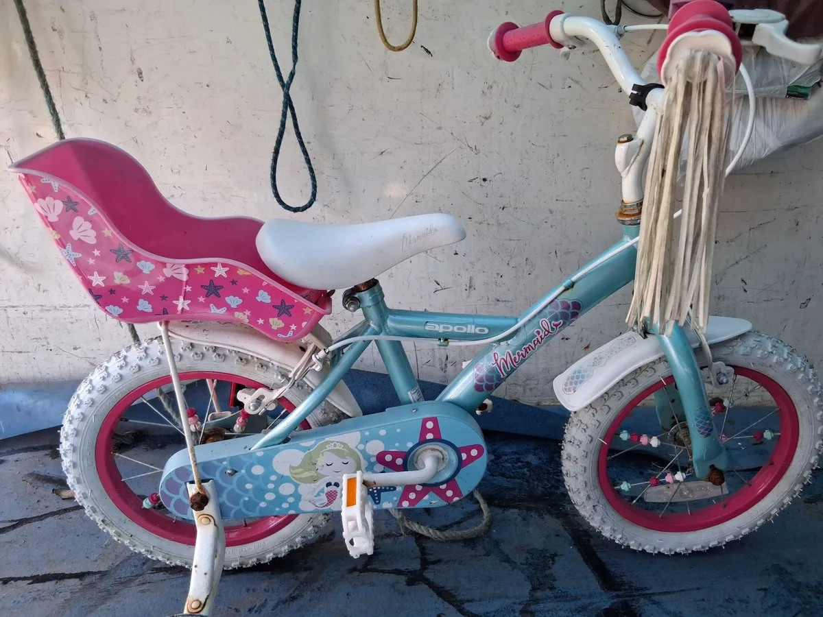 Girls Apollo Mermaid bike with stabilisers. - Image 1