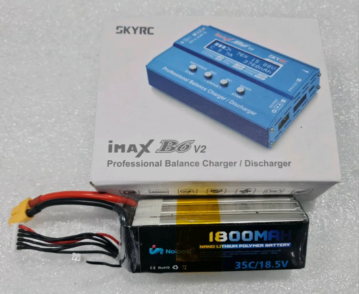 Battery and Charger - Image 1