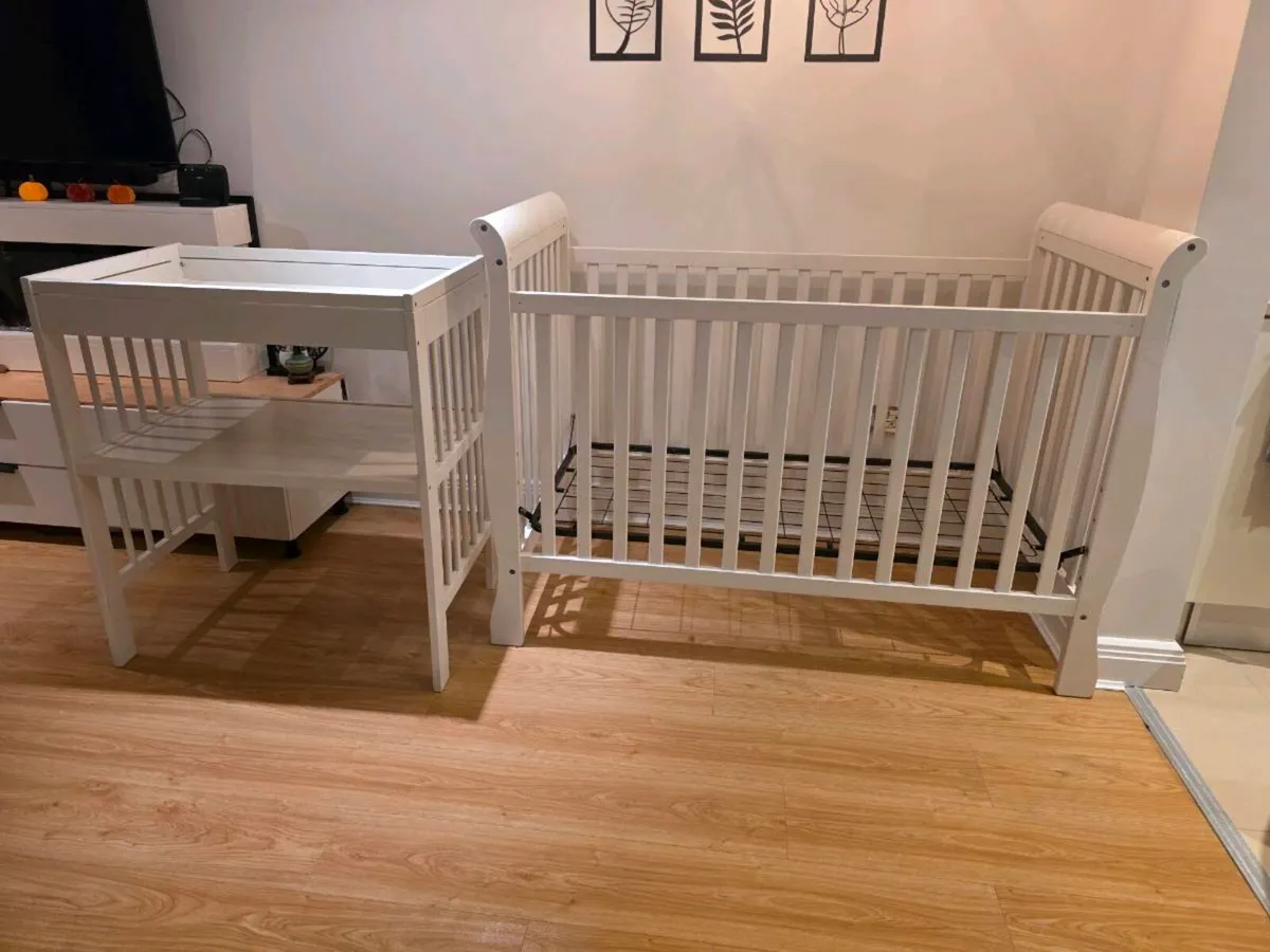 sleigh-style  baby crib and changing table - Image 1