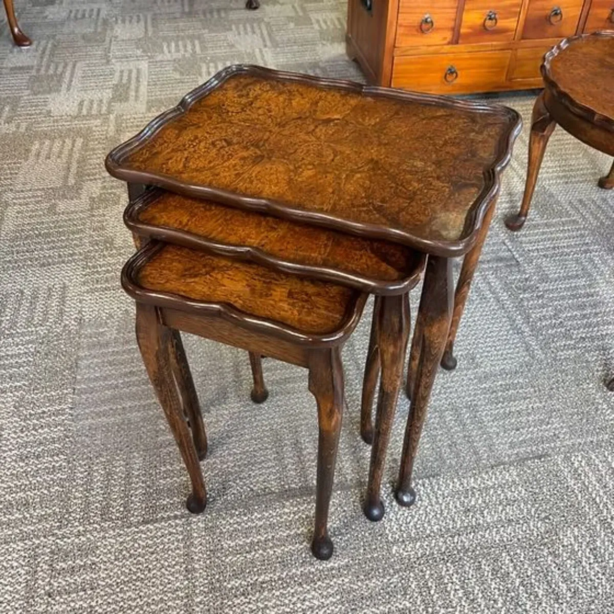 Vintage set of three nest of tables raised on cabr