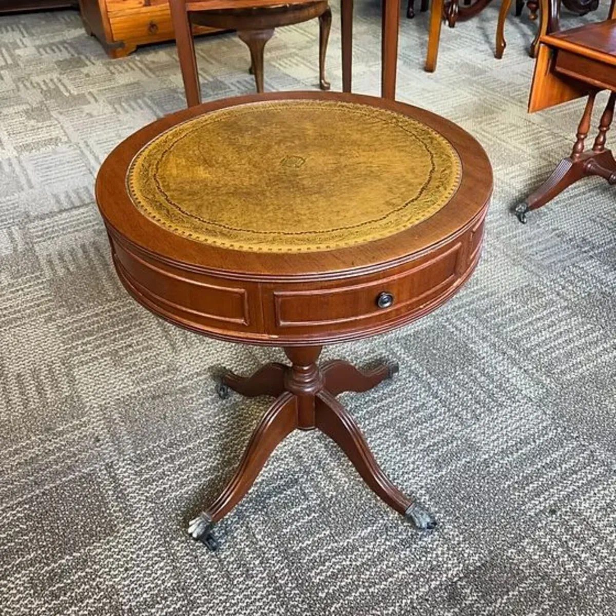 Mahogany drum tan leather top table with two drawe
