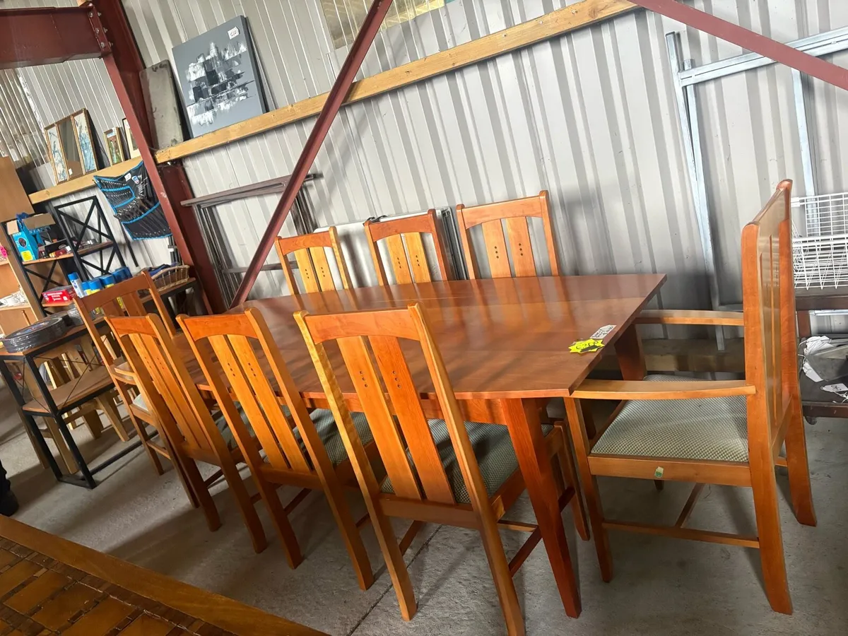 Gilbert and Logan table and 8 chairs - Image 1