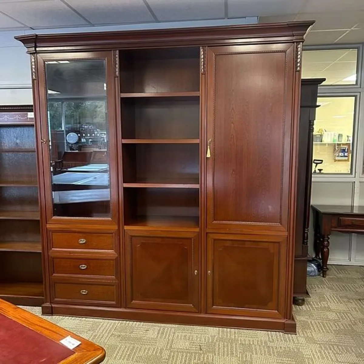 Traditional breakfront library wall unit featuring