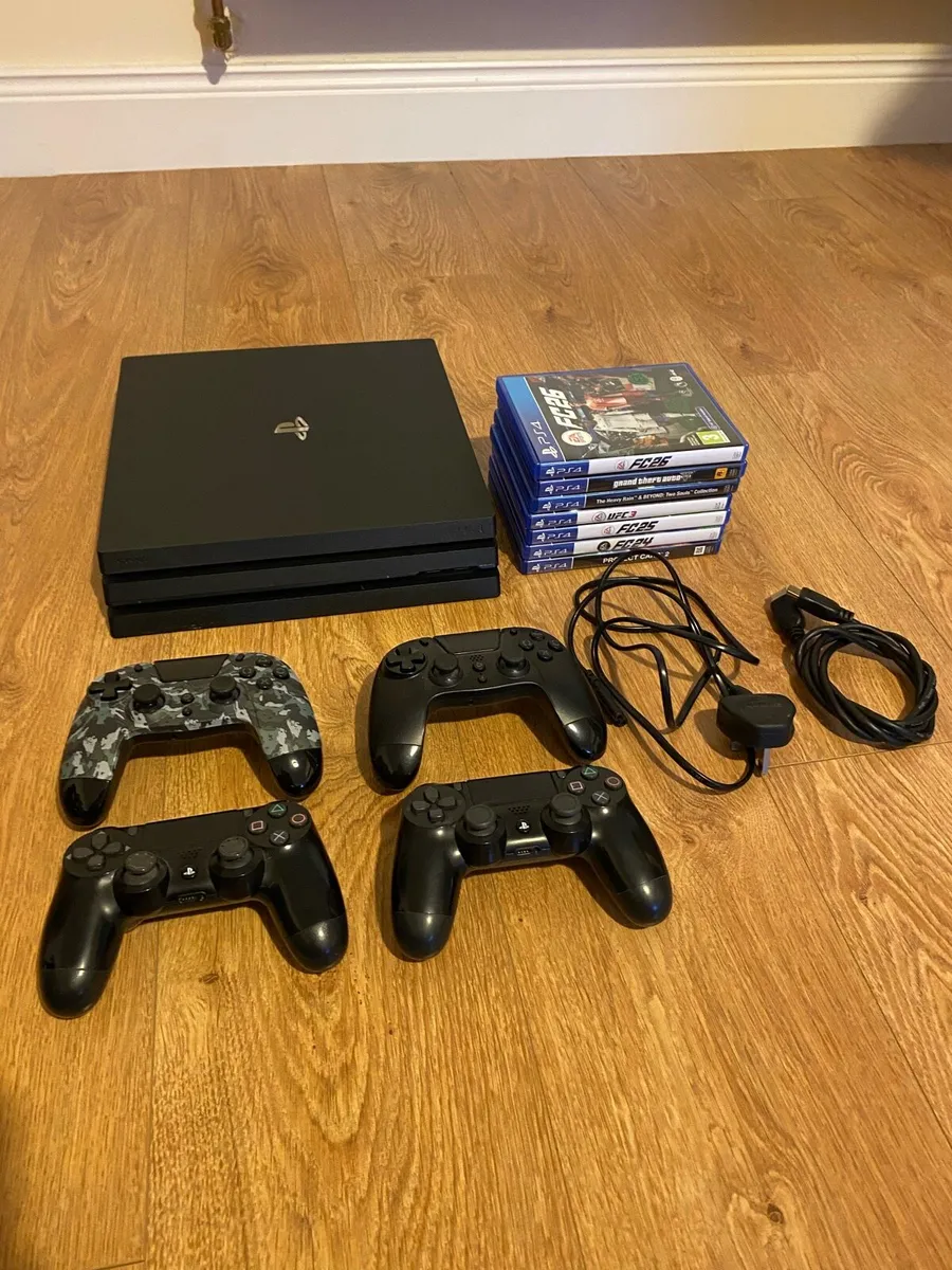 PlayStation 4 Pro 1TB Black + 7 games - Image 1