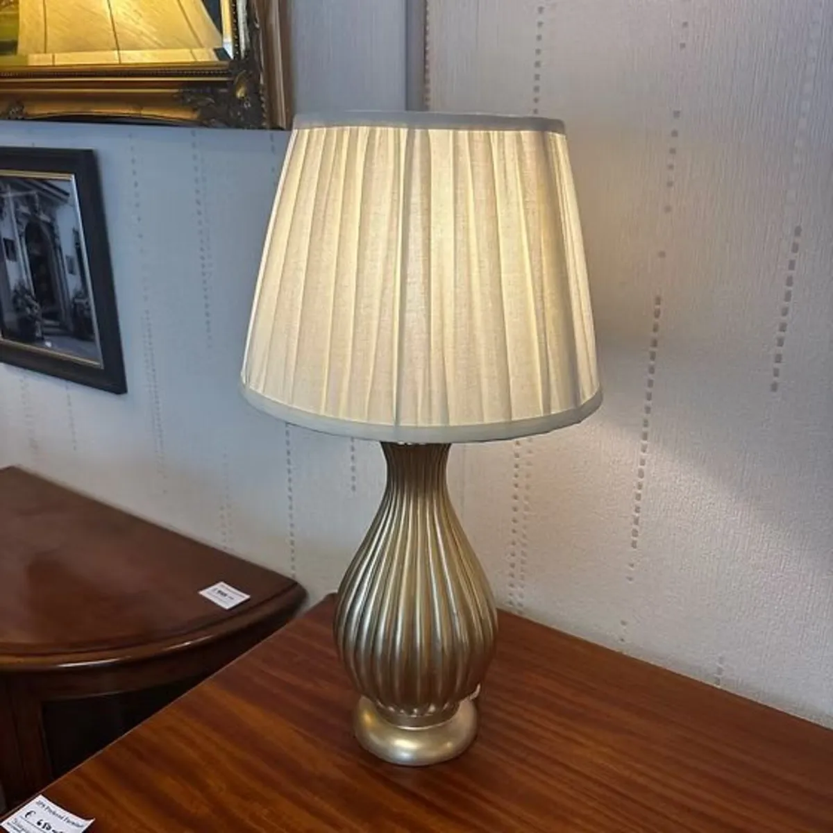 Classic gilt painted table lamp with an elegant, r