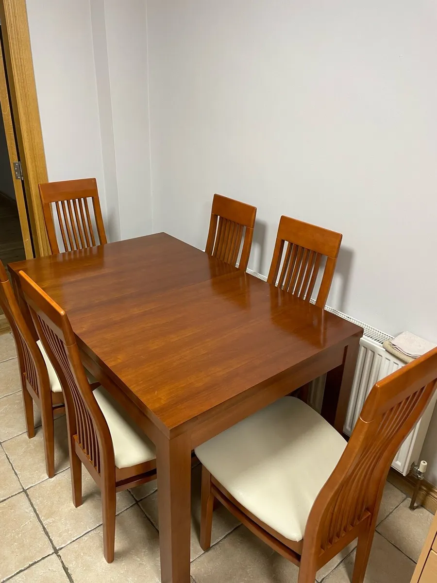 Kitchen dining table and 6 white chairs - Image 2