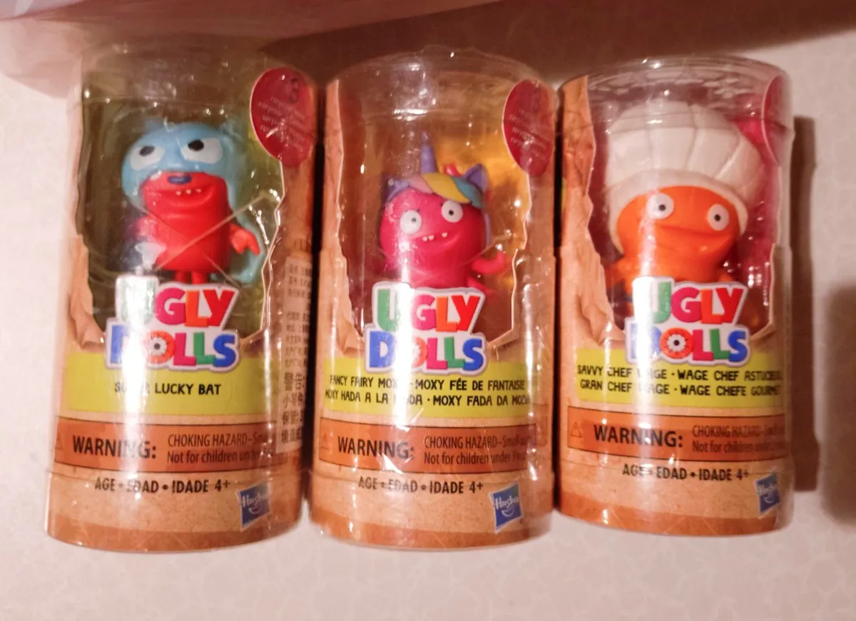 3 Ugly Dolls In Plastic Case (new). - Image 1