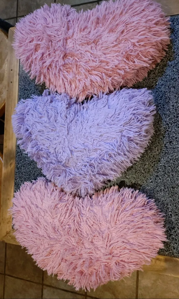 1 Purple & 2 Pink Fluffy Cushions (used). - Image 1