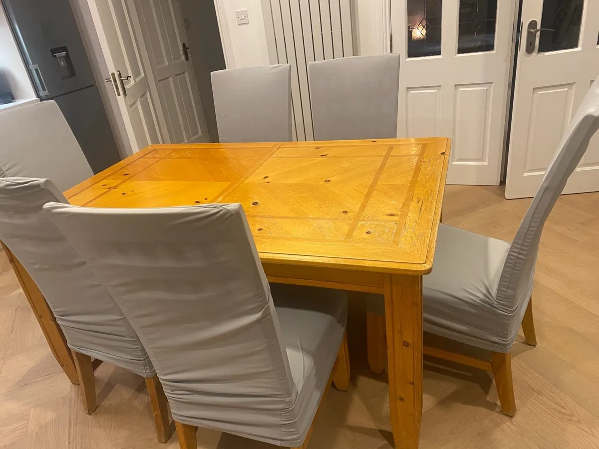 Large Extendable Wood Dining Table & 8 chairs - Image 1
