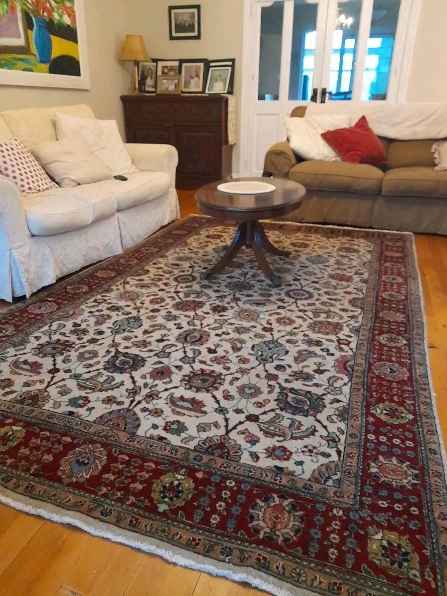 Cream ground rug with  multi colour pattern - Image 1