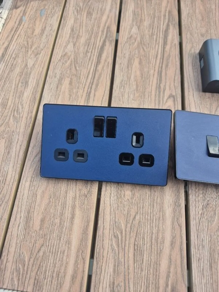 Navy blue socket and light switch - Image 1