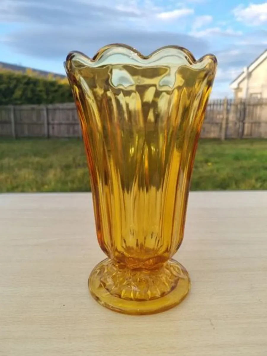 Amber vase on a foot made of pressed glass - Image 1