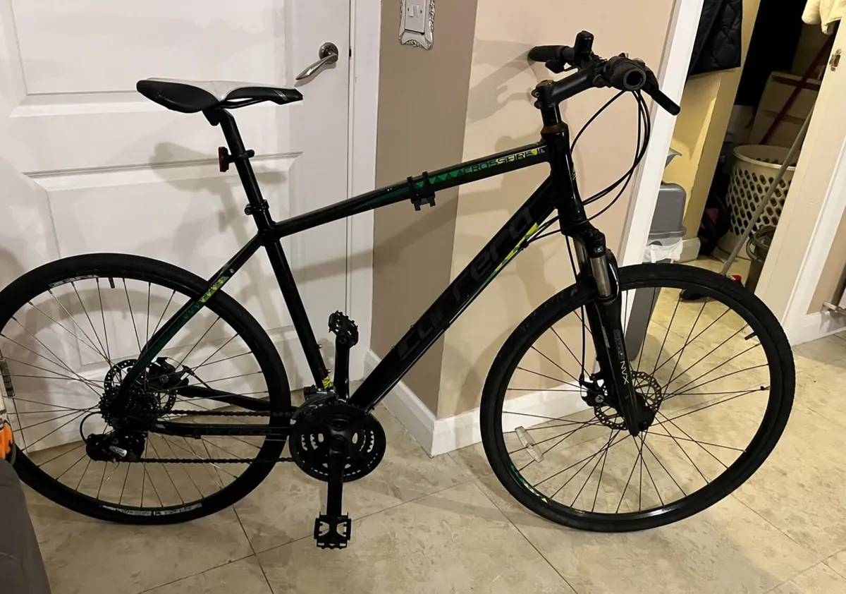 ADULTS CARRERA CROSSFIRE HYBRID MOUNTAIN BIKE. 24 - Image 1