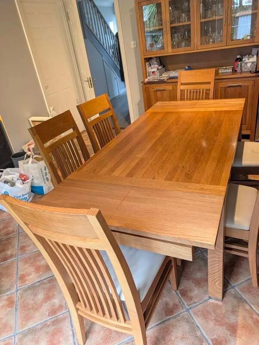 solid oak extending dining table and chairs - Image 2