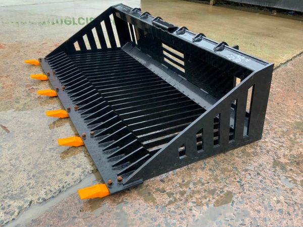 UNUSED SKID STEER STONE RAKE / BUCKET....318wa 379602800
