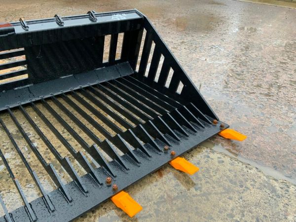 UNUSED SKID STEER STONE RAKE / BUCKET....318wa 379602801