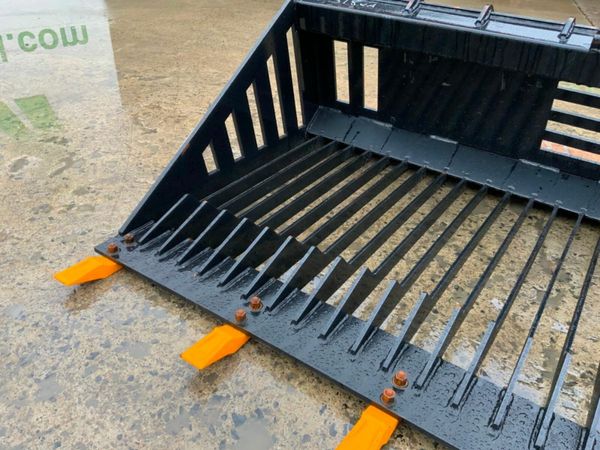 UNUSED SKID STEER STONE RAKE / BUCKET....318wa 379602802