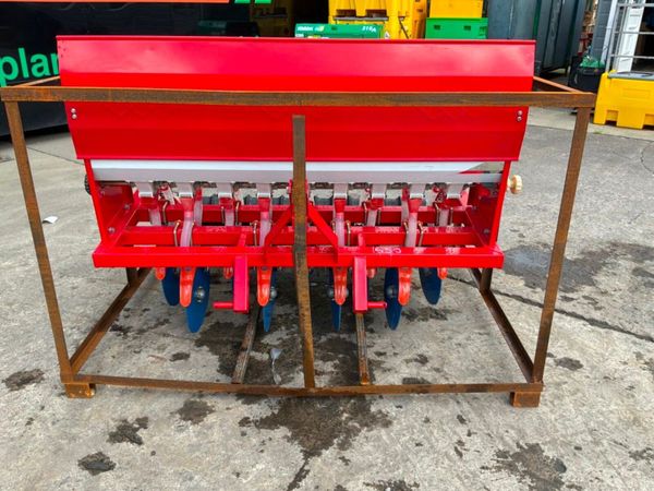 UNUSED 9 ROW GROUND DRIVEN SEED PLANTER. 389597142