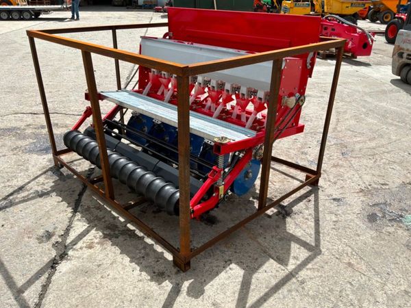 UNUSED 9 ROW GROUND DRIVEN SEED PLANTER. 389597123