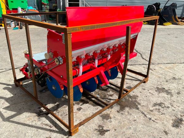 UNUSED 9 ROW GROUND DRIVEN SEED PLANTER. 389597130