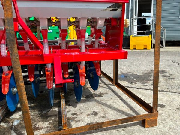 UNUSED 9 ROW GROUND DRIVEN SEED PLANTER. 389597133