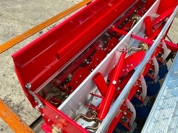 UNUSED 9 ROW GROUND DRIVEN SEED PLANTER. 389597136