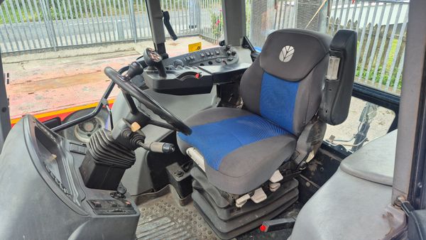 New Holland T7550 394697631